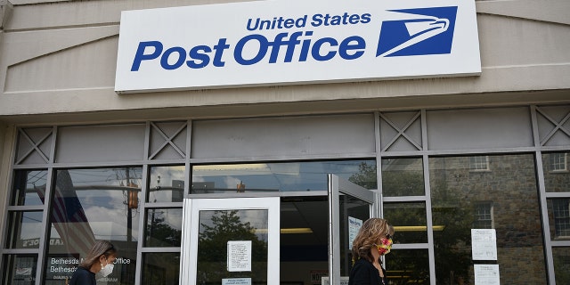 Customers outside a US Post Office in Bethesda, Maryland on August 21, 2020.