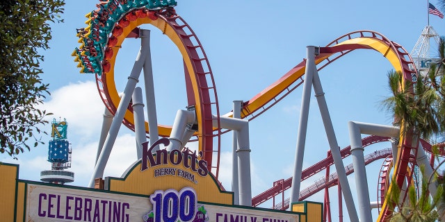 A view of the entrance as park-goers ride the Silver Bullet roller coaster during the re-opening day at Knott's Berry Farm to the full public and celebrate the 100th anniversary of the park after the easing of coronavirus pandemic restrictions Saturday, May 29, 2021 in Buena Park, CA.
