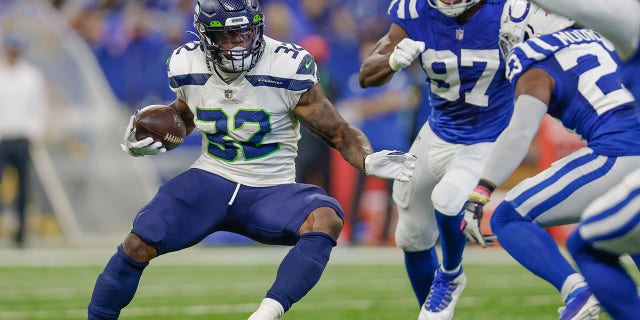 Chris Carson #32 of the Seattle Seahawks runs the ball during the game against the Indianapolis Colts at Lucas Oil Stadium on Sept. 12, 2021 in Indianapolis, Indiana.
