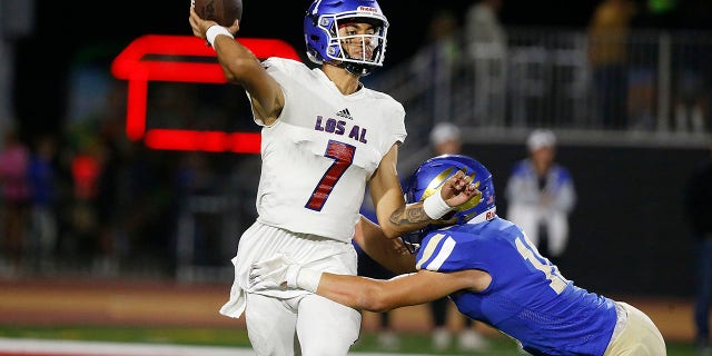 Quarterback Malachi Nelson of Los Alamitos attempts a pass at Saddleback College Stadium on Sept. 17, 2021, in Mission Viejo, California.