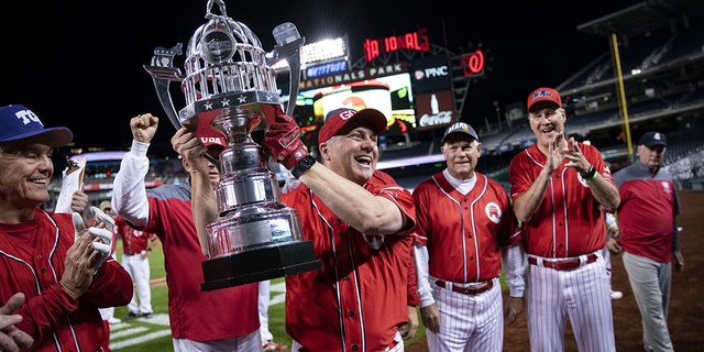 House Minority Whip Steve Scalise holds the trophy following the Republicans 13-12 victory of the Congressional Baseball Game at Nationals Park on Sept. 29, 2021