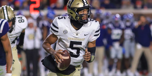 Vanderbilt Commodores quarterback Mike Wright looks downfield during the Ole Miss Rebels game on Nov. 20, 2021, at Vaught-Hemingway Stadium in Oxford, Mississippi.
