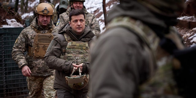 President Volodymyr Zelenskyy visits front-line positions of his nation's military in Donbass, Ukraine, on Dec.  6, 2021.