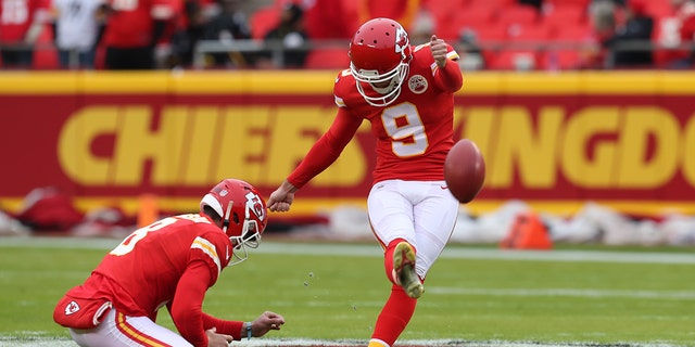 Kansas City Chiefs kicker Elliot Fry (9) bats from player Johnny Townsend (8) prior to a game against the Pittsburgh Steelers on December 26, 2021 at GEHA Field at Arrowhead Stadium in Kansas City, Missouri. 