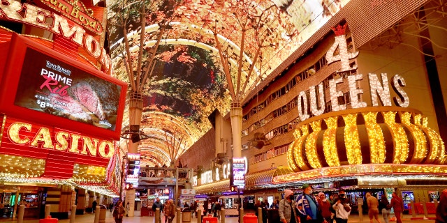 Las Vegas officials are considering a curfew following two recent shootings on Fremont Street.