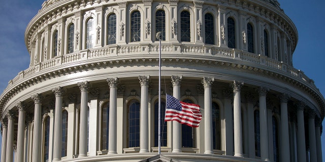 The American flag flies at half-staff before a ceremony for late Senator Harry Reid at the U.S. Capitol on January 12, 2022 in Washington, D.C.