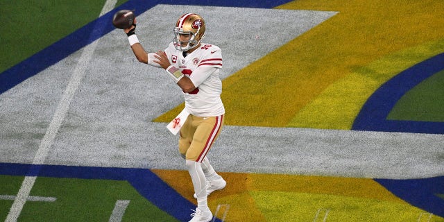 San Francisco 49ers QB Jimmy Garoppolo in action in the NFC Championship against the Los Angeles Rams at SoFi Stadium in Inglewood, Calif., Jan. 30, 2022 Football.