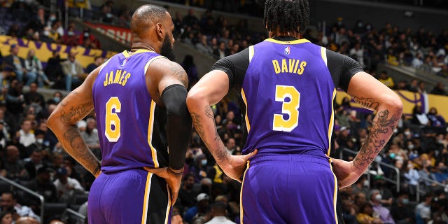 LeBron James (6) of the Los Angeles Lakers talks to teammate Anthony Davis (3) during a game against the Utah Jazz Feb. 16, 2022, at Crypto.Com Arena in Los Angeles.