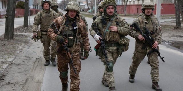 Russia confirms 6 Belarusian soldiers fighting for Ukraine captured or killed in Luhansk 2 Servicemen of Ukrainian Military Forces walk in the small town of Sievierodonetsk, Lugansk Oblast, Feb. 27, 2022.