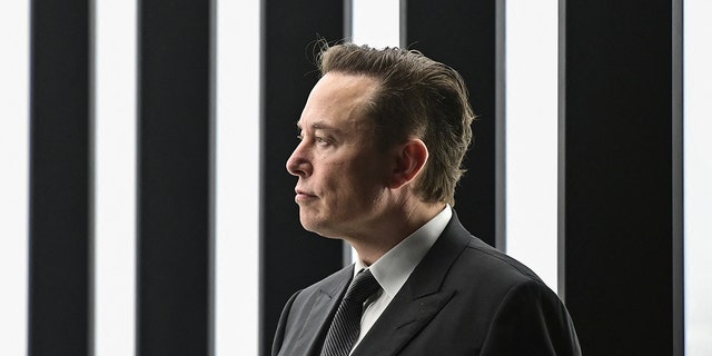Tesla CEO Elon Musk is pictured as he attends the start of the production at Tesla's "Gigafactory" on March 22, 2022 in Gruenheide, southeast of Berlin. (Photo by Patrick Pleul / POOL / AFP) (Photo by PATRICK PLEUL/POOL/AFP via Getty Images)