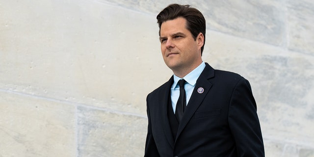 Rep. Matt Gaetz, R-Fla., walks down the House steps at the Capitol after the last votes of the week on April 1, 2022.