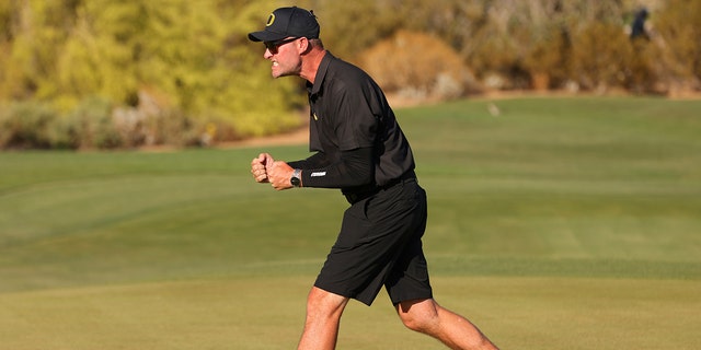 Head coach Derek Radley of the Oregon Ducks reacts after Briana Chacon of the Oregon Ducks makes a putt during the Division I women's golf championship at the Grayhawk Golf Club May 25, 2022, in Scottsdale, Ariz.