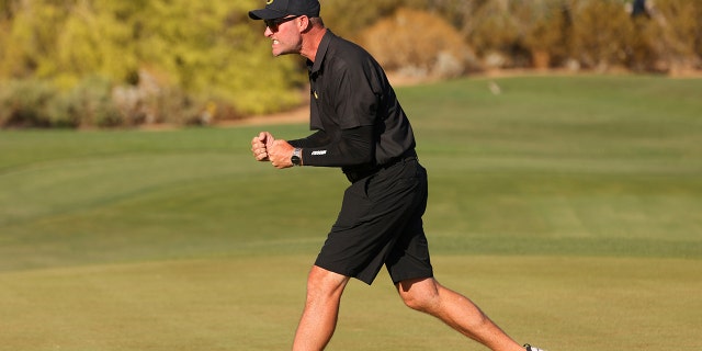 Head coach Derek Radley of the Oregon Ducks reacts after Briana Chacon of the Oregon Ducks makes a putt during the Division I women's golf championship at the Grayhawk Golf Club May 25, 2022, in Scottsdale, Ariz.