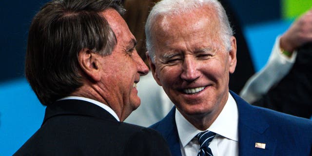 Top Shot-Brazil President Jail Borsonaro (left) and US President Joe Biden pose for a family photo at the 9th Summit of the Americas on June 10, 2022 in Los Angeles, California. Chat  (Photo courtesy of Chandan KHANNA / AFP) (Photo courtesy of CHANDANKHANNA / AFP via Getty Images)