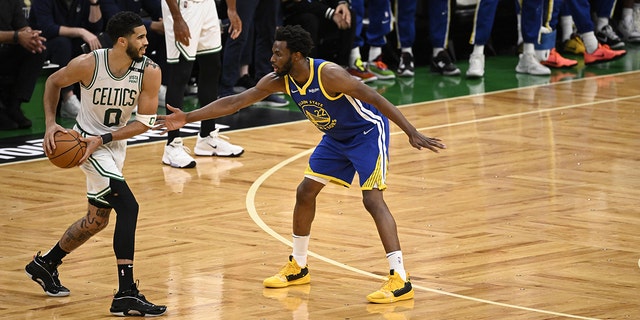 NBA Finals: Golden State Warriors Andrew Wiggins in action, defending vs. Boston Celtics at TD Garden.