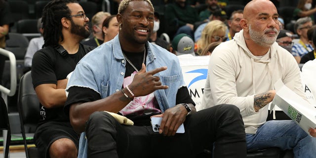 DK Metcalf attends a WNBA game between the Los Angeles Sparks and the Seattle Storm at the Climate Pledge Arena in Seattle, Washington, on June 25, 2022.