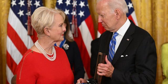 President Biden presents Cindy McCain, the widow of former Senator and presidential candidate John McCain, posthumously with the Presidential Medal of Freedom, the nation's highest civilian honor, during a ceremony honoring 17 recipients, in the East Room of the White House in Washington, D.C., July 7, 2022.