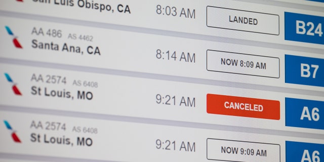 UNITED STATES - JULY 8: An American Airlines flight arrivals monitor displays delayed flights as well as one canceled flight at Phoenix Sky Harbor Airport in Phoenix, Ariz., on Friday, July 8, 2022. (Bill Clark/CQ-Roll Call, Inc via Getty Images)