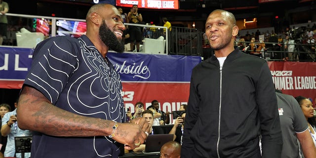 LeBron James #6 of the Los Angeles Lakers talks with General Manager of the Phoenix Suns, James Jones during the 2022 NBA Summer League at the Thomas & Mack Center on July 8, 2022, in Las Vegas, Nevada.  