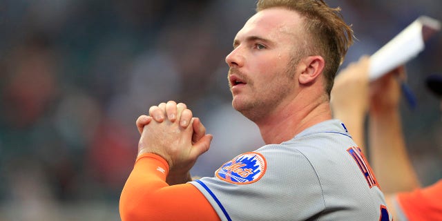 Pete Alonso (20) of the New York Mets looks on during the Tuesday evening MLB game between division rivals the Atlanta Braves and the New York Mets on July 12, 2022, at Truist Park in Atlanta, Georgia.    