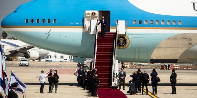 President Biden descends from Air Force One at Ben Gurion International Airport during Biden's visit to Israel.