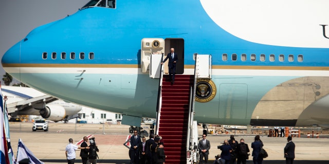 President Biden descends from Air Force One at Ben Gurion International Airport during Biden's visit to Israel.