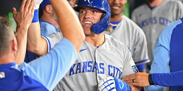 Kansas City Royals Center Field Nate Eaton (18) celebrates in the dugout after homering in the eighth inning during the regular season MLB game between the Kansas City Royals and Toronto Blue Jays on July 14, 2022 at Rogers Centre in Toronto, ON. 