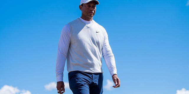 Tiger Woods of the United States approaches the 17th tee during Day Two of The 150th Open at St Andrews Old Course on July 15, 2022 in St Andrews, Scotland. 