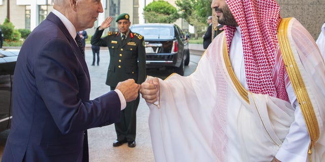 US President Joe Biden (L) being welcomed by Saudi Arabian Crown Prince Mohammed bin Salman (R) at Alsalam Royal Palace in Jeddah, Saudi Arabia 