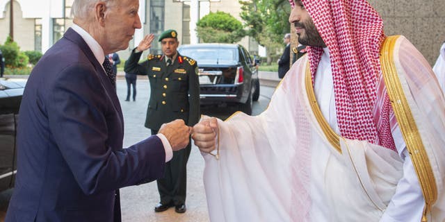 US President Joe Biden (L) being welcomed by Saudi Arabian Crown Prince Mohammed bin Salman (R) at Alsalam Royal Palace in Jeddah, Saudi Arabia on July 15, 2022. 