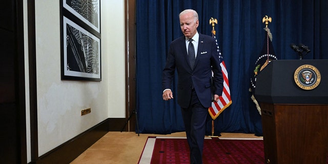 US President Joe Biden exits the room after speaking to the travelling press following a working session with Saudi Arabias Crown Prince at the Al-Salam Palace in Jeddah, on July 15, 2022. (Photo by MANDEL NGAN / AFP) 