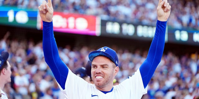 Freddie Freeman #5 of the Los Angeles Dodgers cheers during the T-Mobile Home Run Derby at Dodger Stadium on Monday, July 18, 2022 in Los Angeles, California. 