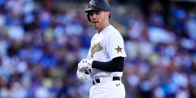 National League All-Star Freddie Freeman of the Los Angeles Dodgers walks off the field after grounding out against the American League All-Stars during the third inning of an MLB All-Star baseball game at Dodger Stadium in Los Angeles on Tuesday, July 19, 2022.