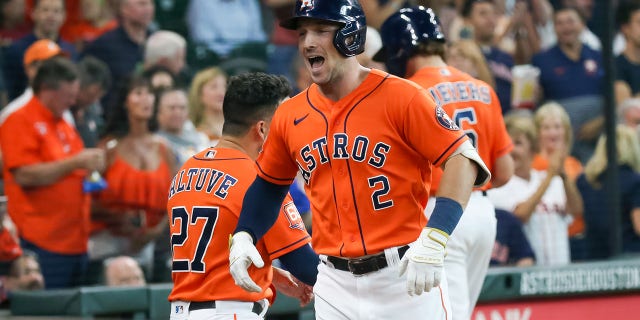 Houston Astros third baseman Alex Bregman, #2, reacts after hitting a home run in the bottom of the first inning during the MLB doubleheader Game 2 between the New York Yankees and Houston Astros on July 21, 2022 at Minute Maid Park in Houston, Texas.