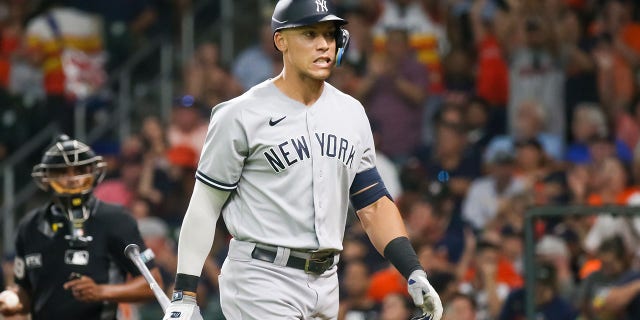 New York Yankees designated hitter Aaron Judge, #99, reacts after striking out in the top of the seventh inning during the MLB doubleheader Game 2 between the New York Yankees and Houston Astros on July 21, 2022 at Minute Maid Park in Houston, Texas.