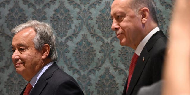 United Nations (UN) Secretary-General Antonio Guterres (L) and Turkish President Recep Tayyip Erdogan (R) arrive for a signature ceremony of an initiative on the safe transportation of grain and foodstuffs from Ukrainian ports, in Istanbul, on July 22, 2022.