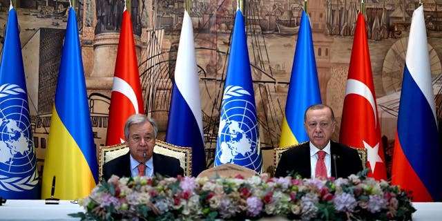 United Nations (UN) Secretary-General Antonio Guterres (L) and Turkish President Recep Tayyip Erdogan (R) sit at the start of the signature ceremony of an initiative on the safe transportation of grain and foodstuffs from Ukrainian ports, in Istanbul, on July 22, 2022.