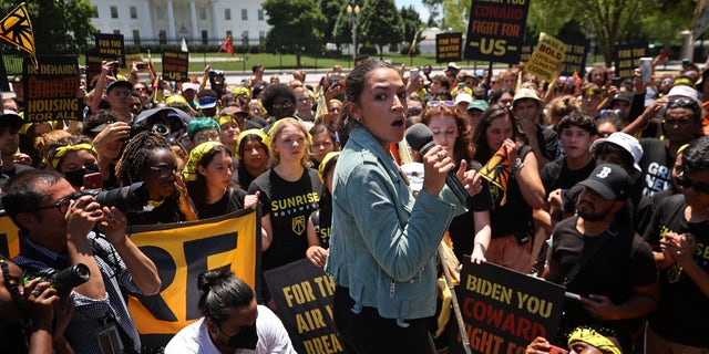 WASHINGTON, DC - JUNE 28: Rep. Alexandria Ocasio-Cortez (D-NY) rallies hundreds of young climate activists in Lafayette Square on the north side of the White House to demand that U.S. President Joe Biden work to make the Green New Deal into law on June 28, 2021 in Washington, DC. Organized by the Sunrise Movement, the 'No Climate, No Deal' marchers demanded a meeting with Biden to insist on an 'infrastructure package that truly invests in job creation and acts to combat the climate crisis.' (Photo by Chip Somodevilla/Getty Images)