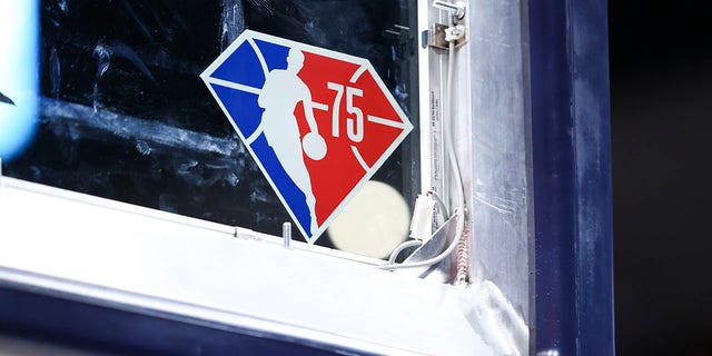 A logo commemorating the NBA's 75th anniversary can be seen on the sign before the game between the Denver Nuggets and Washington Wizards at Ball Arena on December 13, 2021 in Denver, Colorado.
