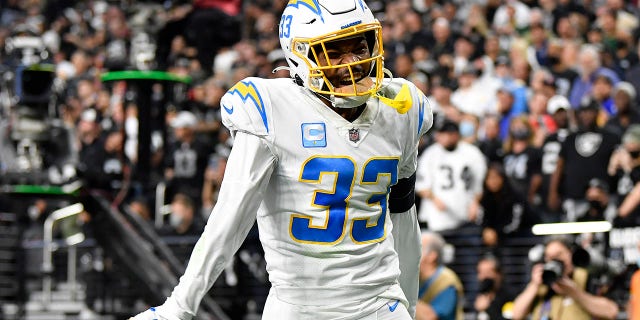 Derwin James of the Los Angeles Chargers celebrates an incompletion by the Las Vegas Raiders during the third quarter at Allegiant Stadium Jan. 9, 2022, in Las Vegas.