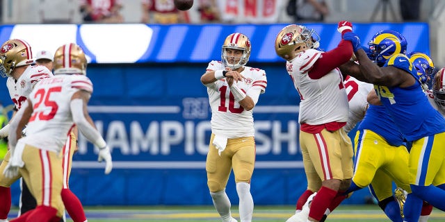 Jimmy Garoppolo (10) of the San Francisco 49ers passes during a game against the Los Angeles Rams at SoFi Stadium Jan. 30, 2022, in Inglewood, Calif.