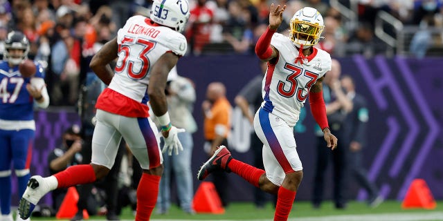 Derwin James of the Los Angeles Chargers and AFC waves after getting an interception against the NFC during the NFL Pro Bowl at Allegiant Stadium on Feb. 6, 2022, in Las Vegas.