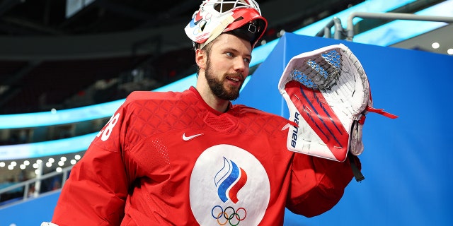 Goalie Ivan Fedotov of Team ROC reacts while leaving the rink after defeating Team Denmark 3-1 in a men’s ice hockey quarterfinal match between Team ROC and Team Denmark on Day 12 of the Beijing 2022 Winter Olympic Games at Wukesong Sports Centre Feb. 16, 2022, in Beijing, China. 