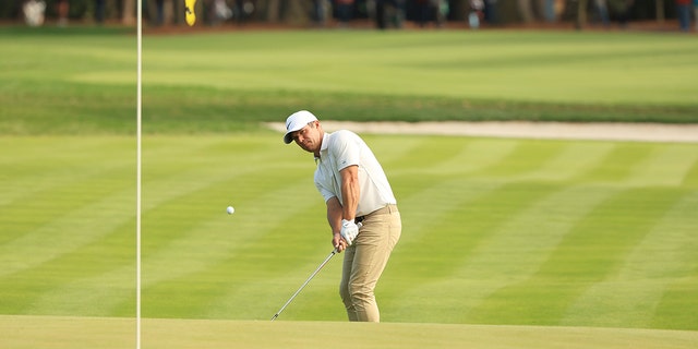Paul Casey of England chips to the 15th green during the final round of THE PLAYERS Championship on the Stadium Course at TPC Sawgrass on March 14, 2022 in Ponte Vedra Beach, Florida. 