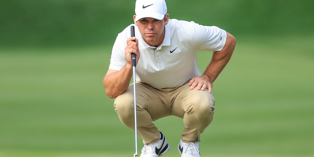 Paul Casey of England lines up a putt on the par 4, 14th hole during the final round of THE PLAYERS Championship at TPC Sawgrass on March 14, 2022 in Ponte Vedra Beach, Florida. 