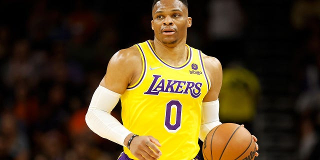 Russell Westbrook #0 of the Los Angeles Lakers handles the ball during the first half of the NBA game at Footprint Center on April 5, 2022 in Phoenix, Arizona.
