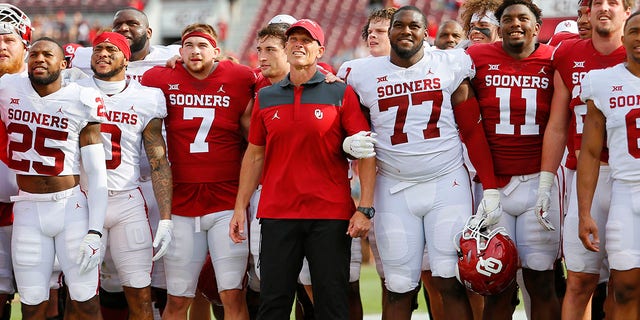 Head coach Brent Venables of the Oklahoma Sooners speaks with his team for his alma mater during their spring game at Gaylord Family Memorial Stadium in Oklahoma on April 23, 2022 in Norman, Oklahoma.  