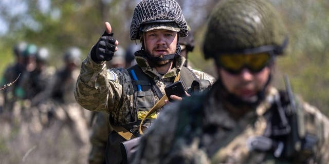 Ukrainian infantrymen train May 09, 2022 near Dnipropetrovsk Oblast, Ukraine. Infantry soldiers learned scenarios to survive when potentially confronted with a Russian tank closing in at close range. The frontline with Russian troops lies only 70km to the south in Kherson Oblast, most of which is controlled by Russia. 