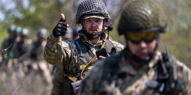 Ukrainian infantrymen train on May 09, 2022 near Dnipropetrovsk Oblast, Ukraine. Infantry soldiers learned scenarios to survive when potentially confronted with a Russian tank closing in at close range. The frontline with Russian troops lies only 70km to the south in Kherson Oblast, most of which is controlled by Russia. 