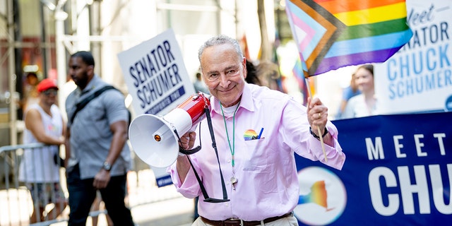 U.S. Senator Chuck Schumer marches during the 2022 New York City Pride March on June 26, 2022 in New York City.